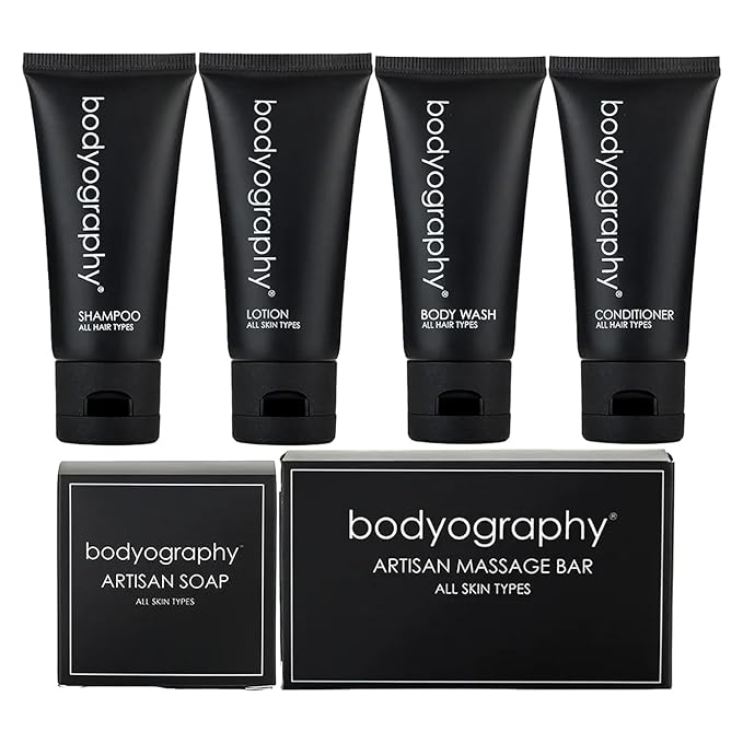 World Amenities - Bodyography Toiletry Kit - 6 Piece Set Shampoo, Conditioner, Body Wash, Lotion, Hand Soap, Massage Bar, Clear Travel Bag