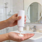 4 Pack 2oz Travel Size Bottles, Refillable Plastic Squeeze Containers with Flip Top Caps, Small Empty Toiletry Dispensers for Shampoo, Lotion, Conditioner