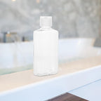 OUNONA 5pcs 100ml Refillable Travel Squeeze Bottles with Flip Cap, Plastic Lotion and Shampoo Containers for Travel Toiletries