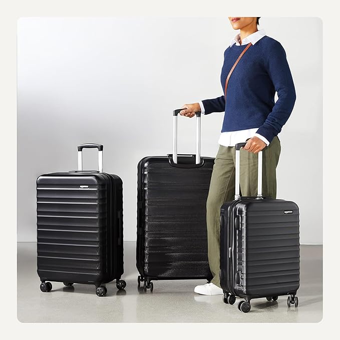 Amazon Basics 3-Piece Hardshell Luggage Set (21", 26", 30"), Scratch-Resistant Expandable Suitcases with Multi-directional Wheels and Telescoping Handle, Black
