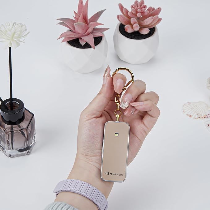 Ultrathin Personal Alarm Rainproof Ultra-Lightweight (0.8 oz) Bulky-Free Keychain Siren for Women, Students Safety. SOS Emergency 130db Hiking Alert Strobe Light. Replaceable Battery. Gold