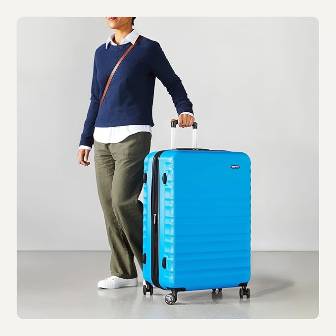 Amazon Basics 30" Hardside Large Checked Luggage, Expandable For Up to 15% More Space, With Scratch-Resistant Surface, Four Multi-directional Wheels, Telescoping Handle, Light Blue