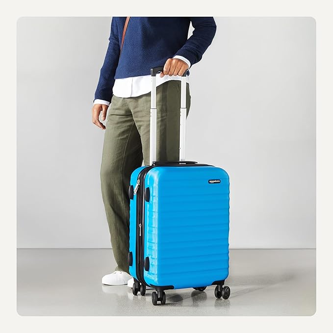 Amazon Basics 21" Hardside Carry-On Luggage with Expandable Space, Scratch-Resistant Surface, Telescoping Handle, Four Multi-directional Wheels, Light Blue
