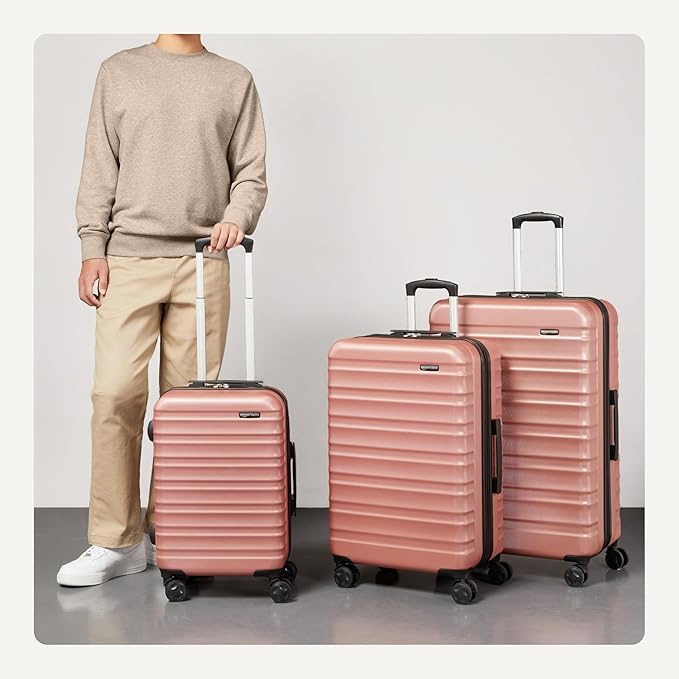 Amazon Basics 3-Piece Hardshell Suitcases Set (21", 26", 30"), Expandable For Up to 25% More Space, With Scratch-Resistant Finish, Four Multi-Directional Wheels, Rose Gold