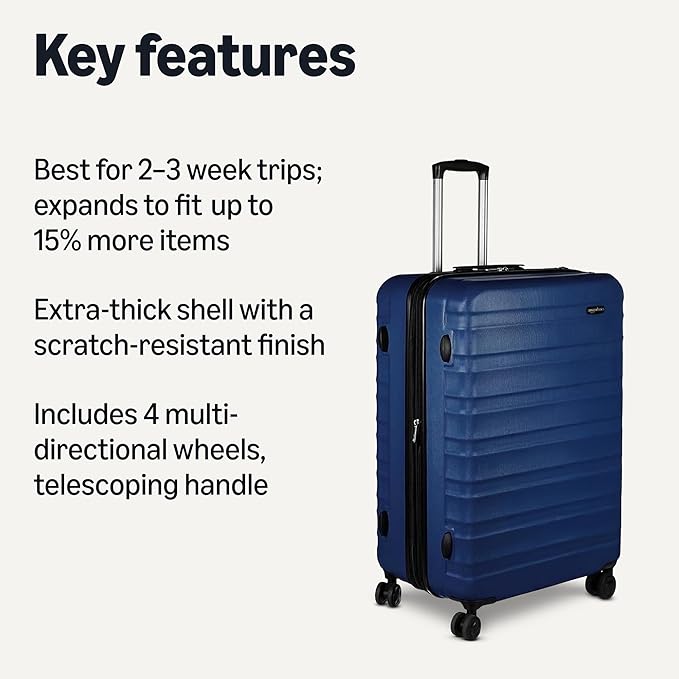 Amazon Basics 30" Hardside Large Checked Luggage with Multi-directional Wheels, Expandable for Up to 15% More Space, Scratch-Resistant Hardshell, Navy Blue