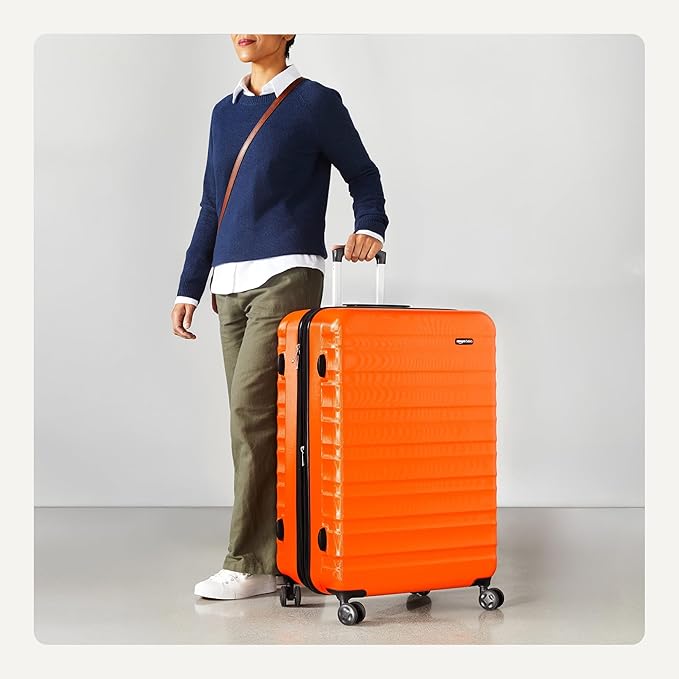 Amazon Basics 30" Hardside Large Checked Luggage, Expandable For Up to 15% More Space, Hardshell Suitcase With Wheels, Scratch-Resistant Surface, Four Multi-directional Wheels, Orange