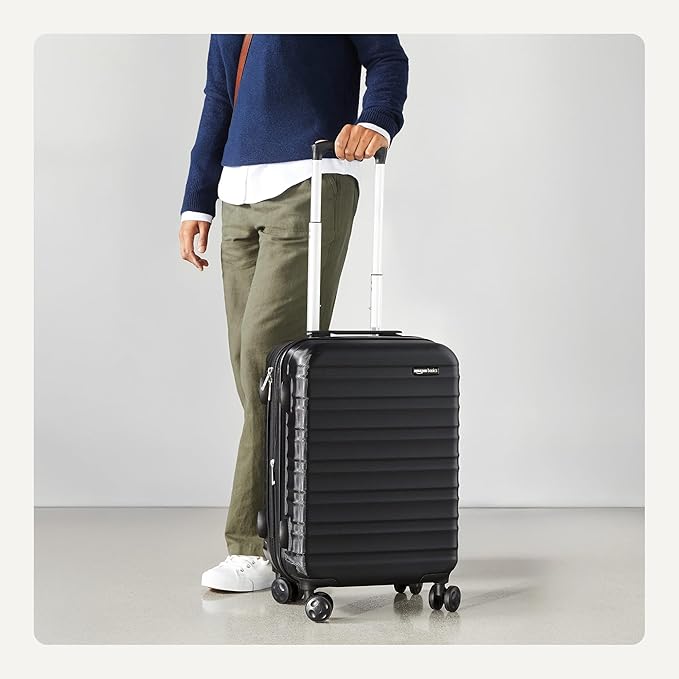 Amazon Basics 21" Hardside Carry-On Luggage with Spinner Wheels, Expandable for Up to 25% More Space, Scratch-Resistant Hard Shell, Telescoping Handle, Black