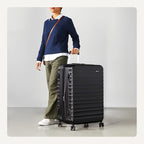 Amazon Basics 30" Hardside Large Checked Luggage, Hardshell Suitcase With Four Multi-directional Wheels, Expandable For Up to 15% More Space, Scratch-Resistant Shell, Black