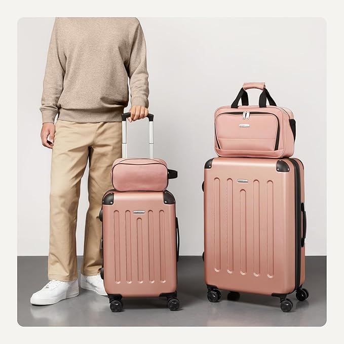 Amazon Basics 4-Piece Luggage Set, Hardside Spinner Suitcases with Multidirectional Wheels (22" Carry-On and 28" Checked), Plus 15-inch Tote Bag and 10-inch Compact Travel Bag, Rose Gold