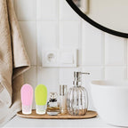 Travel Squeeze Bottles Set of 4-80ml Silicone Toiletry Containers for Travel Shampoo Conditioner Lotion - Portable Leakproof in White Green Blue and Pink for Tsa-approved Hand