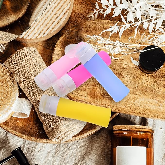 Silicone Travel Bottles 4pcs Refillable Lotion Dispenser Set Squeezable Toiletry Containers for Travel Bathroom Shampoo Conditioner Storage